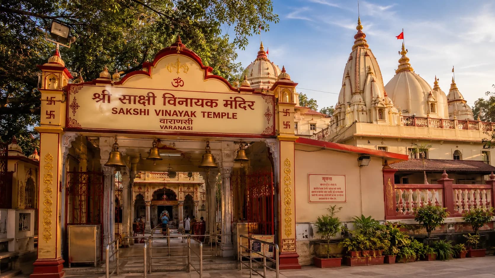 Sakshi Vinayak Temple Varanasi - The red Sakshi Vinayak murti of Ganesha on its raised plinth in Vishwanath Gali