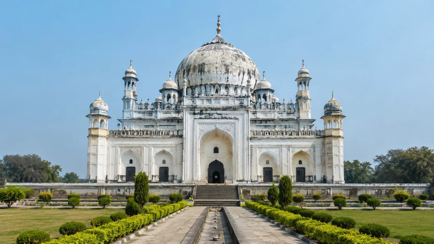 Bahu Begum ka Maqbara Faizabad - The tall white three-domed mausoleum against the sky